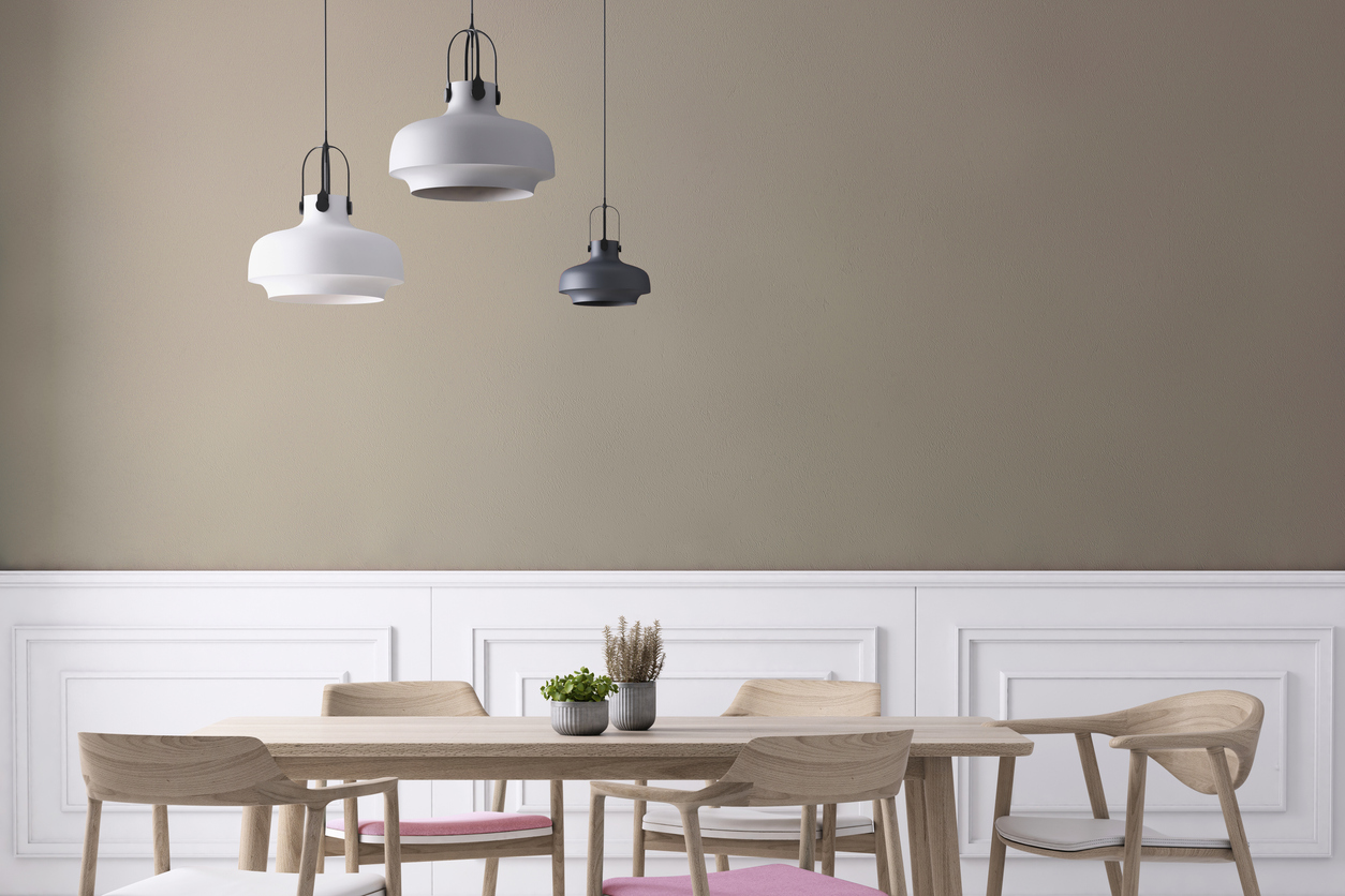 Wainscoting can open up the space without tearing down walls.